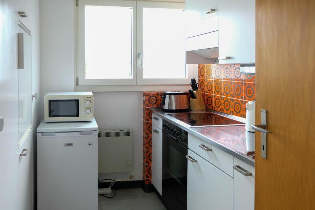 Ferienwohnung Mariposa Spiez Exterior foto